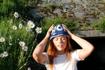 Blue flower crochet bucket hat by Stina Knits