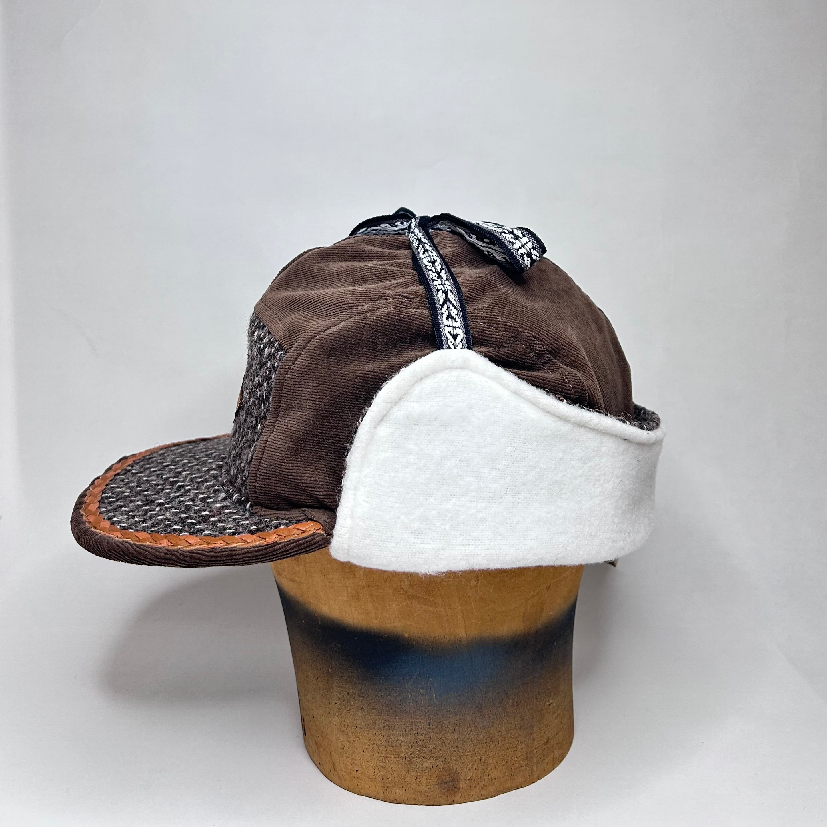 Vinterkeps 59-60cm - brun Manchester, mönstrat ulltyg