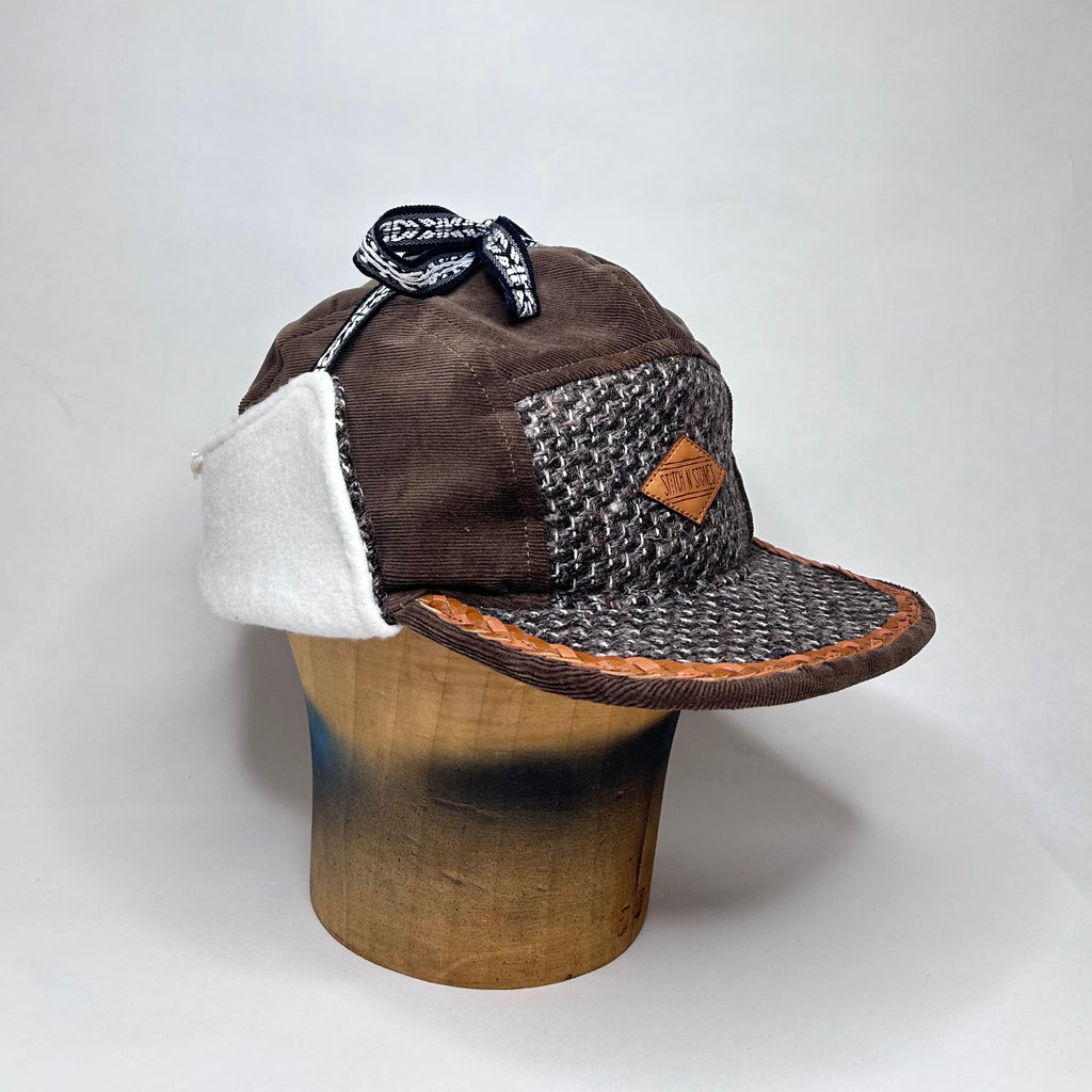 Vinterkeps 59-60cm - brun Manchester, mönstrat ulltyg