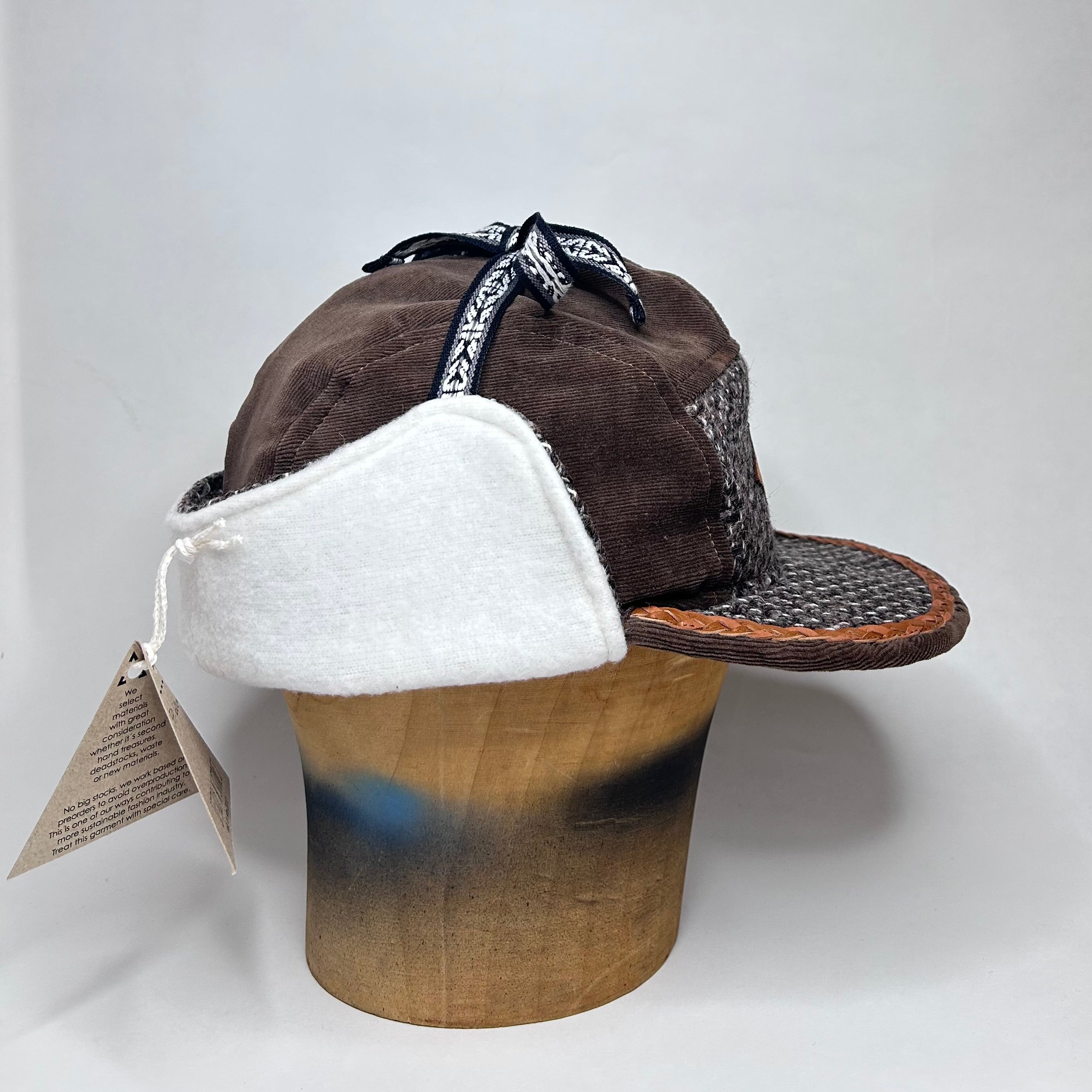 Vinterkeps 59-60cm - brun Manchester, mönstrat ulltyg