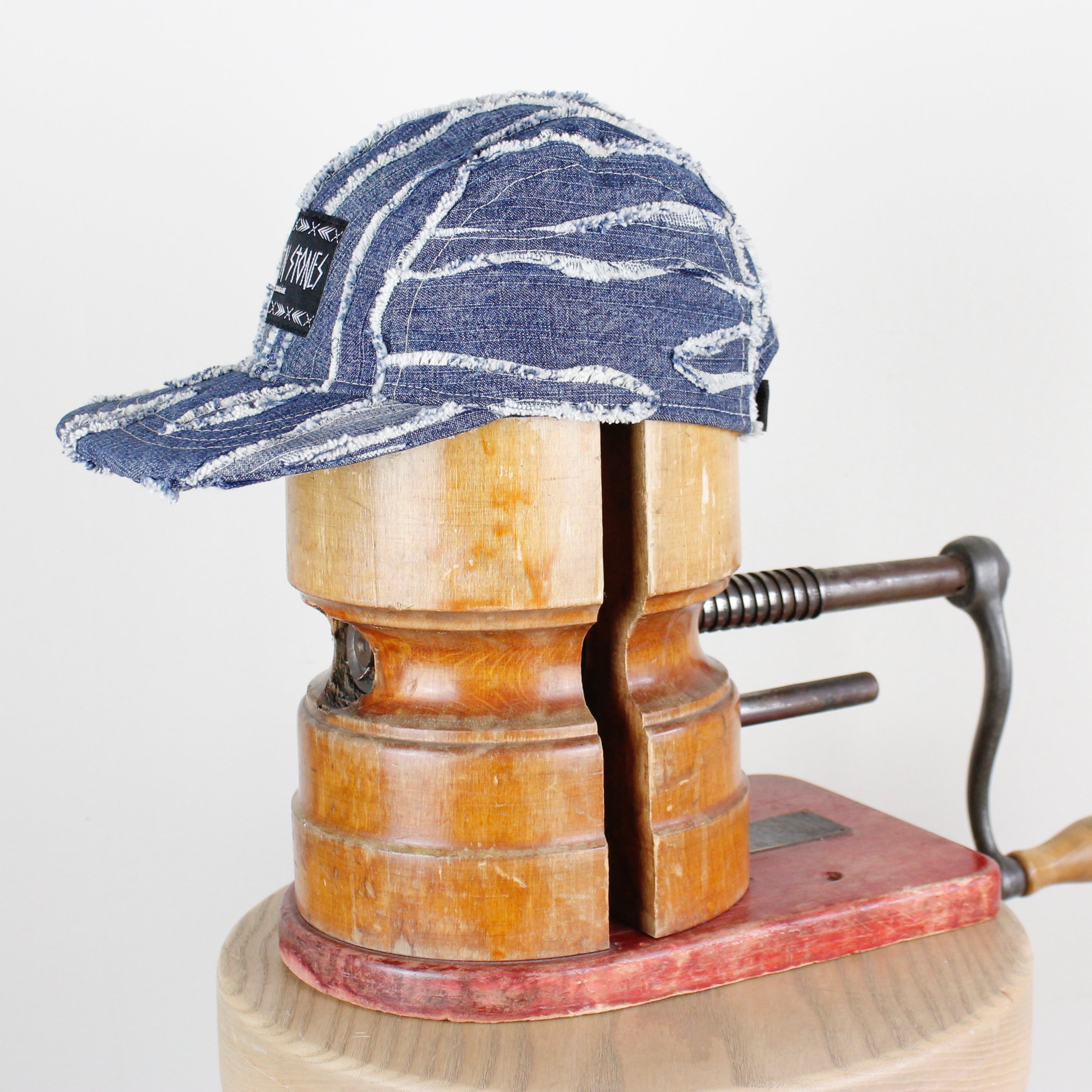 Distressed denim cap
