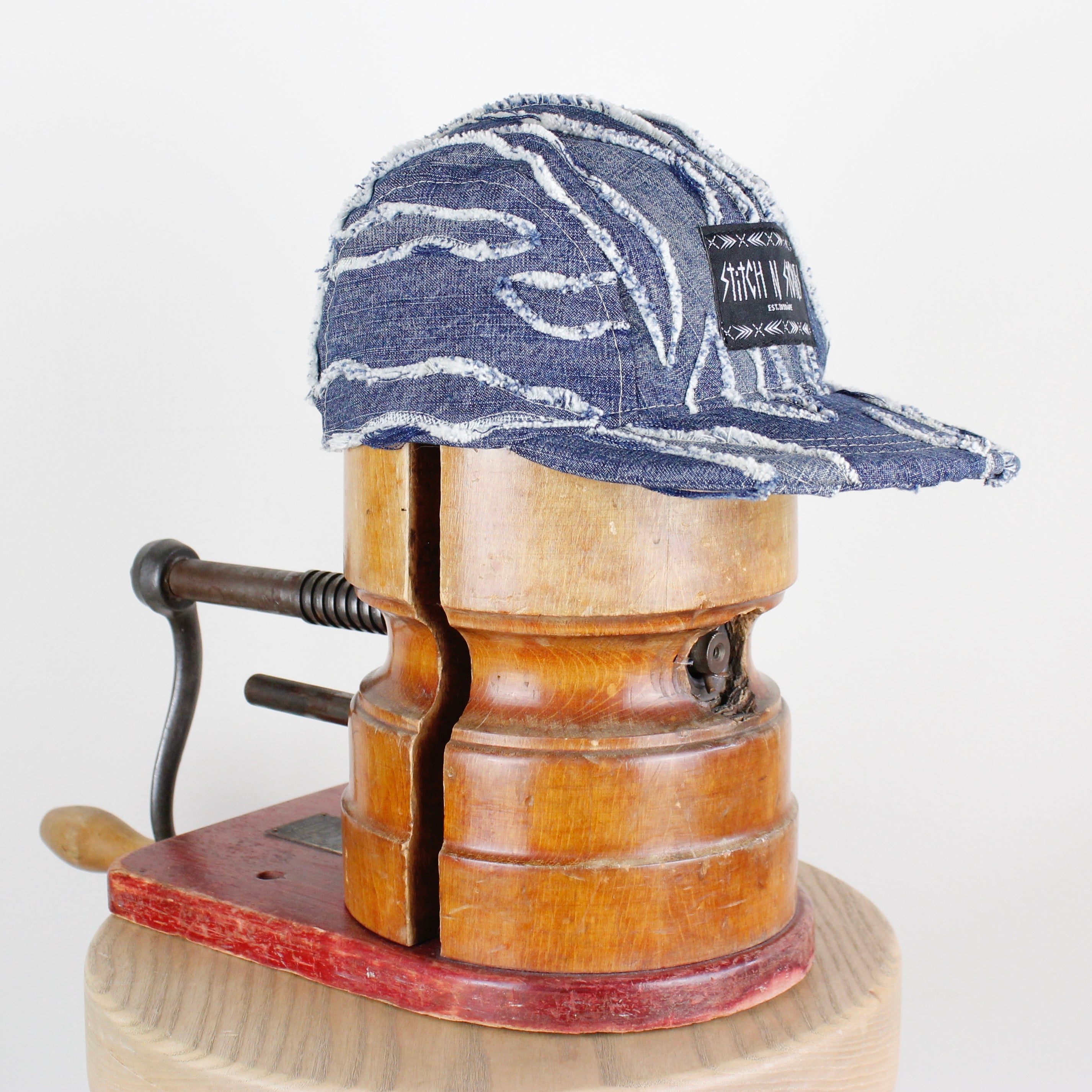 Distressed denim cap