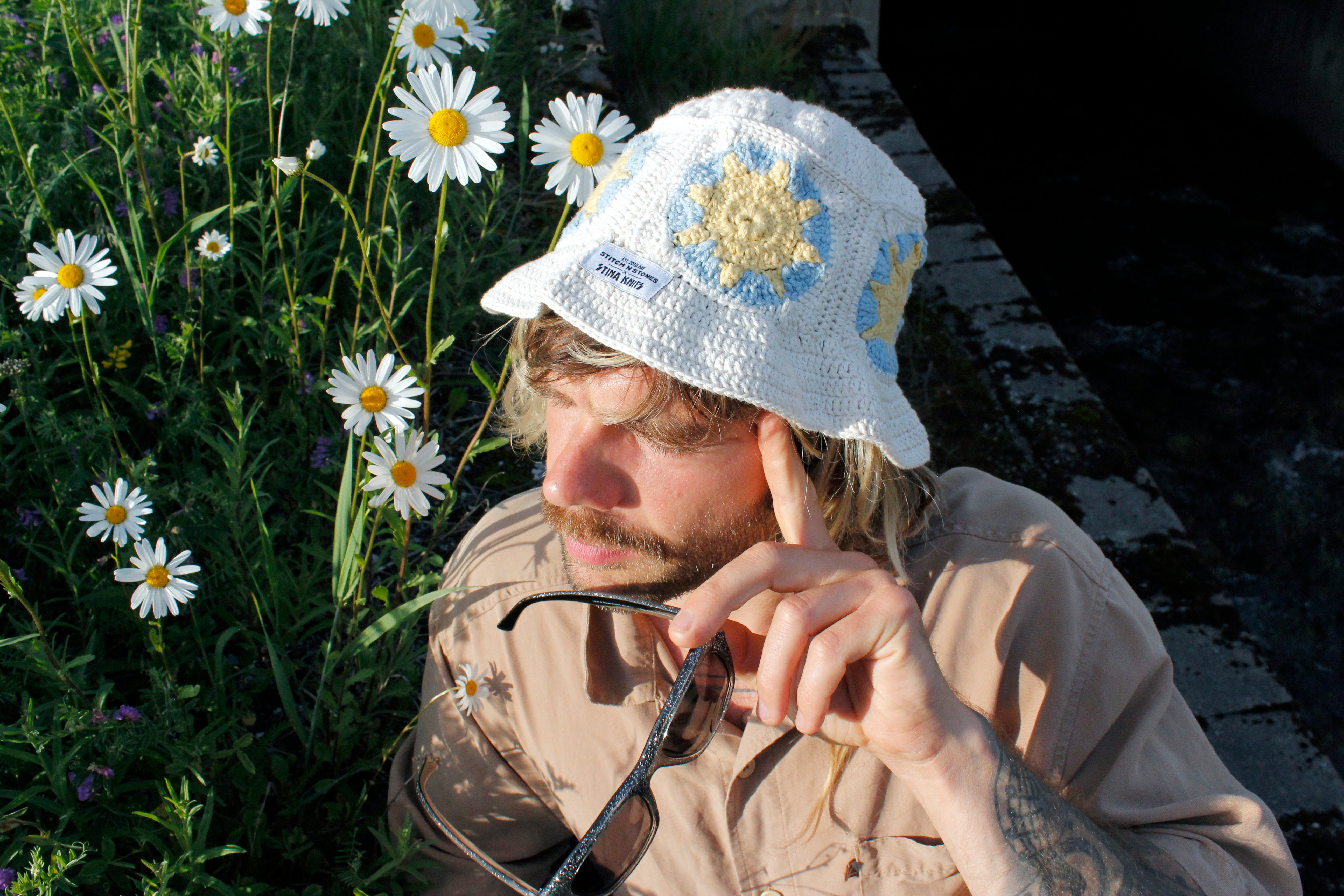 Blue sun crochet bucket hat by Stina Knits