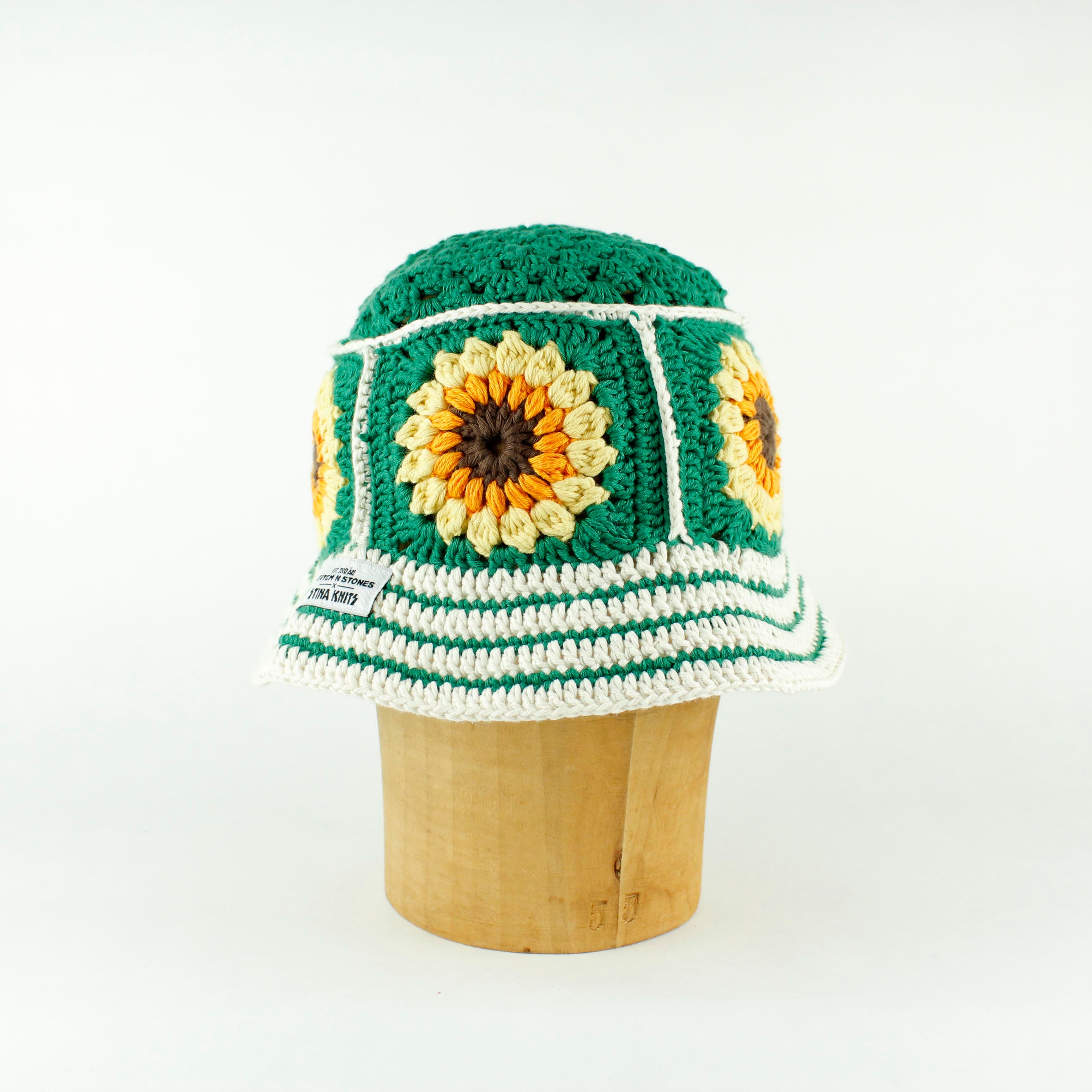 Green white striped crochet bucket hat by Stina Knits