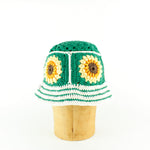 Green white striped crochet bucket hat by Stina Knits