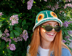 Green white striped crochet bucket hat by Stina Knits