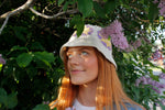 Purple Sun crochet bucket hat by Stina Knits